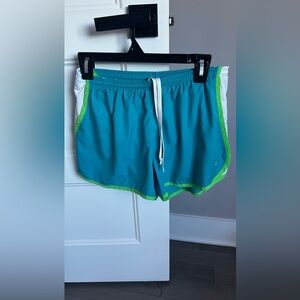 Blue Athletic Shorts with Green Trim